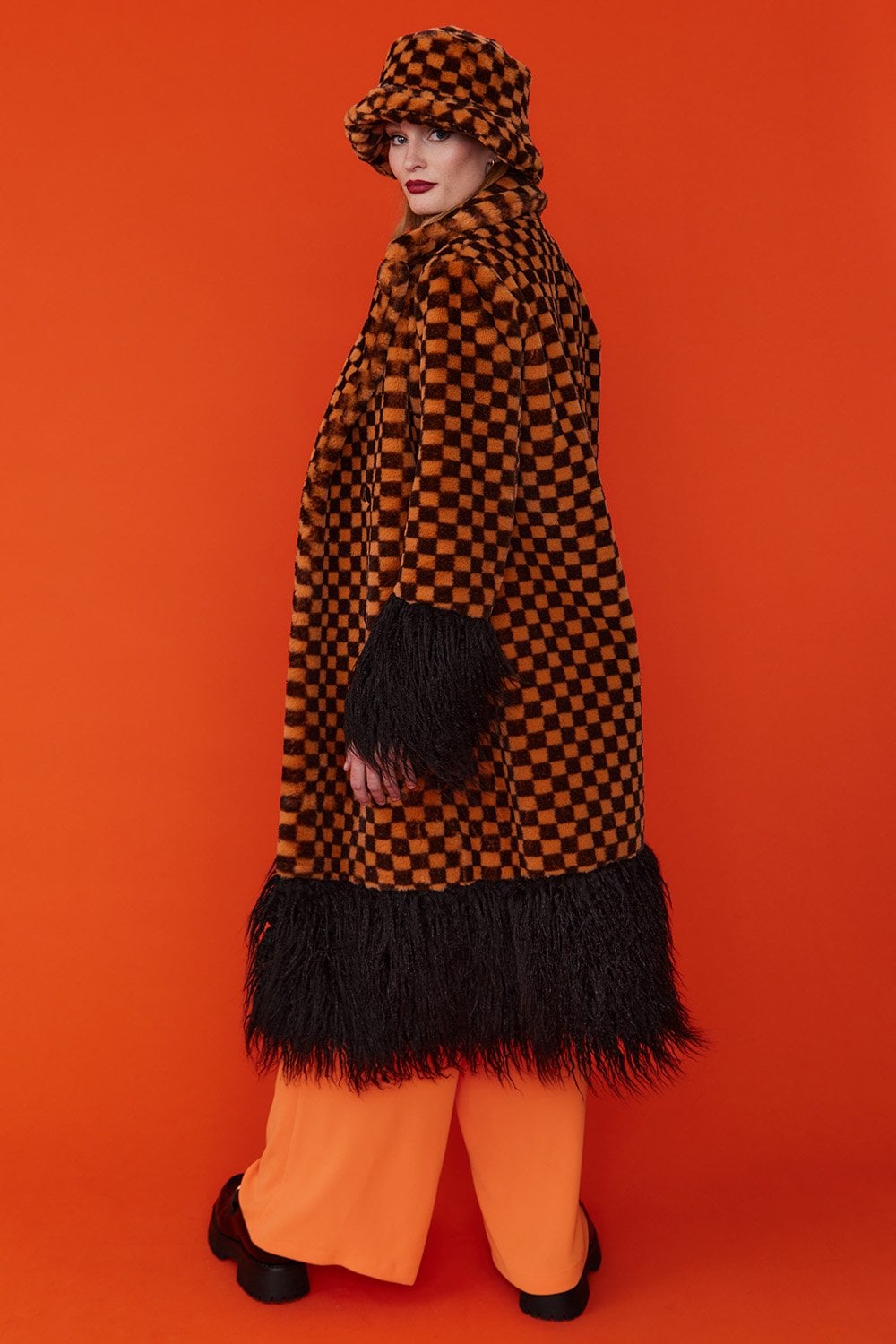 Jayley Faux fur orange and black check coat with faux mongolian trim