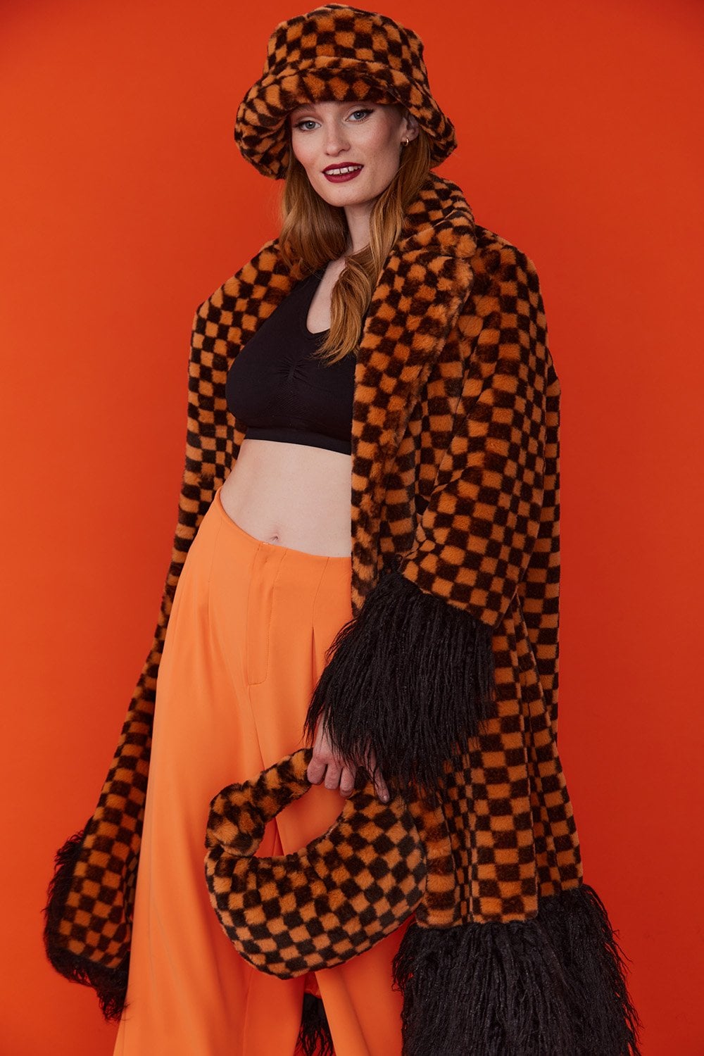Jayley Faux fur orange and black check coat with faux mongolian trim